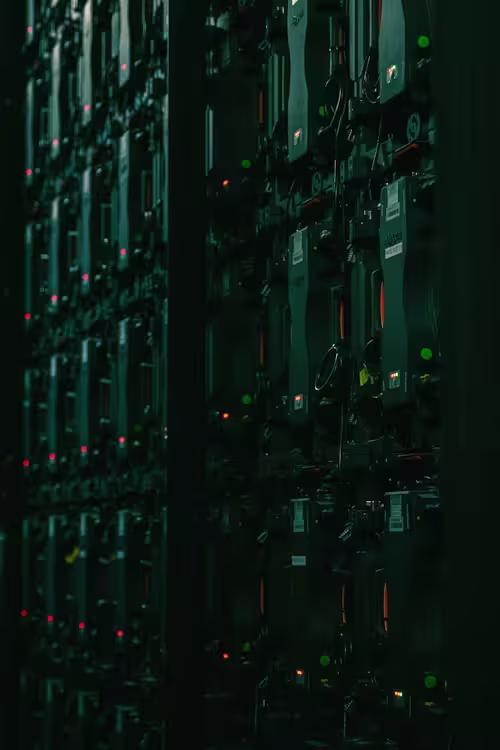 A server rack in a dark room